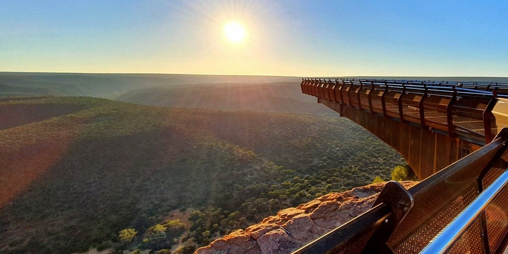 Sun rising over the vast Murchison Gorge as viewed from Kalbarri Skywalk in Kalbarri National Park