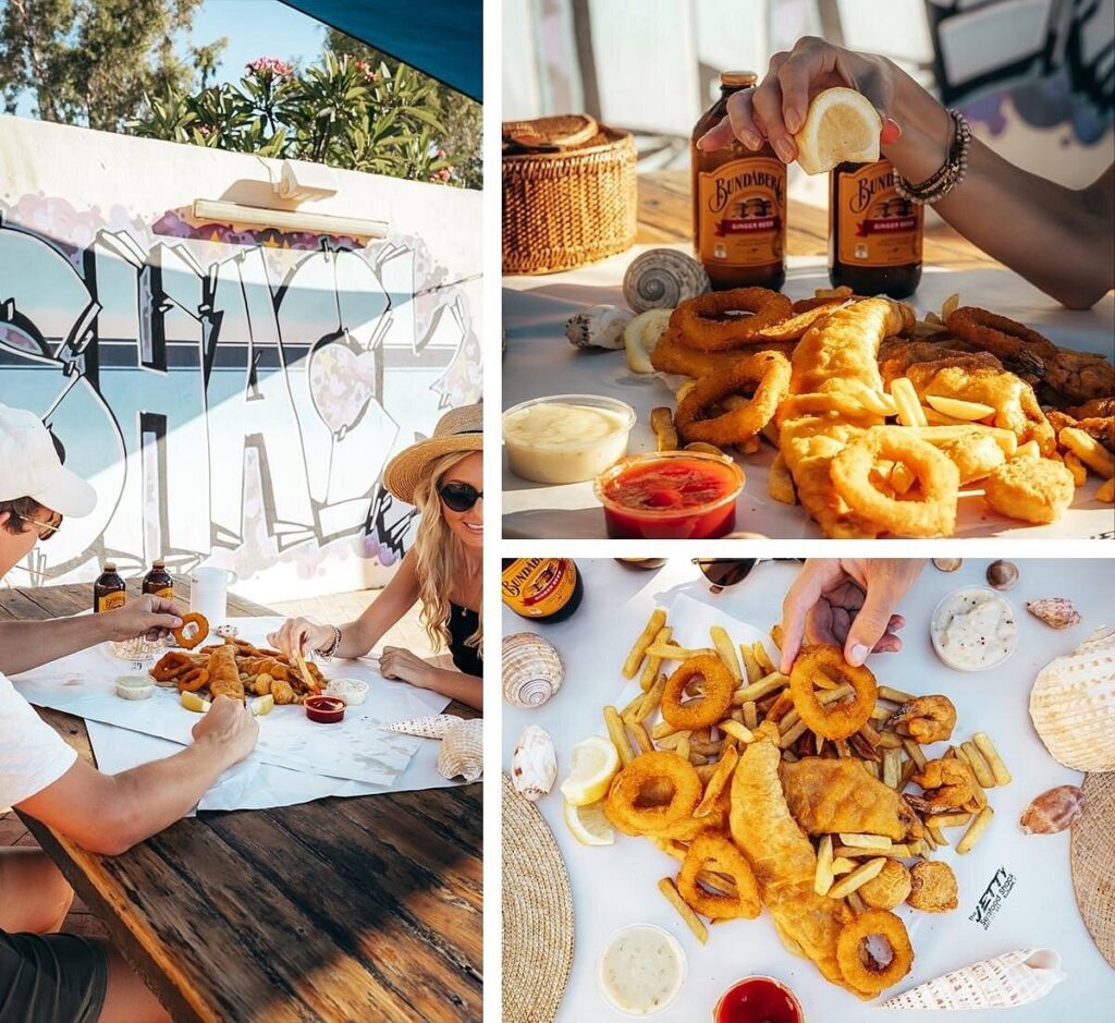 A collage of seafood platters at Jetty Seafood Shack in Kalbarri, featuring crispy fish, calamari rings, and golden fries, served with dipping sauces and lemon wedges in an outdoor beachside setting.